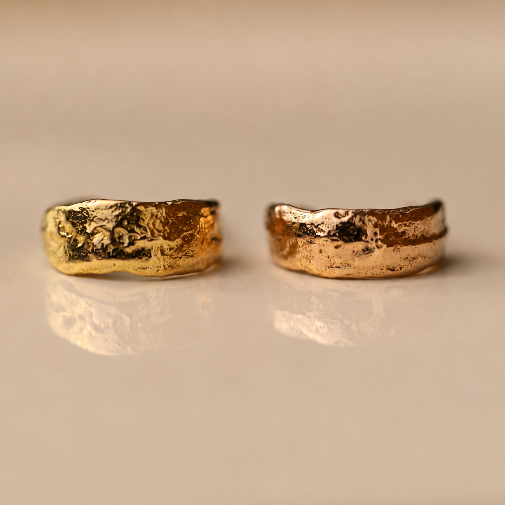 Front view of textured gold vermeil mini hoop stud earrings